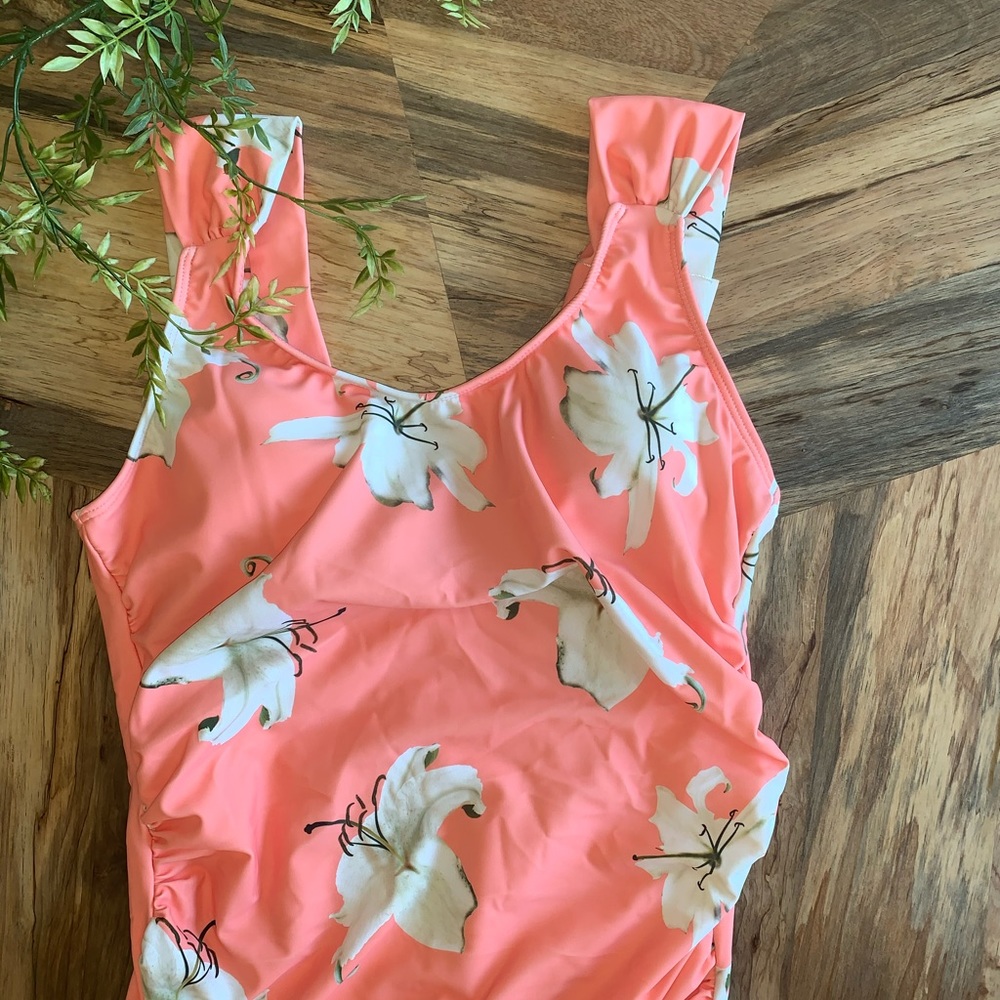 BRAND NEW! Peach floral one piece bathing suit!